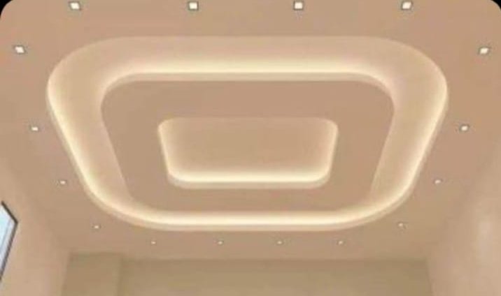Multi-level false ceiling with layered cove lighting